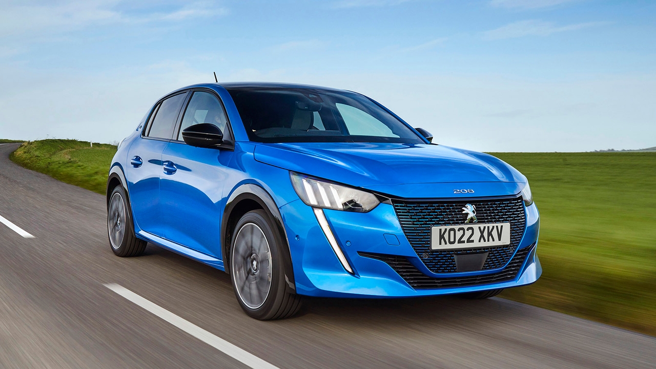 Peugeot 208 in blue, driving shot