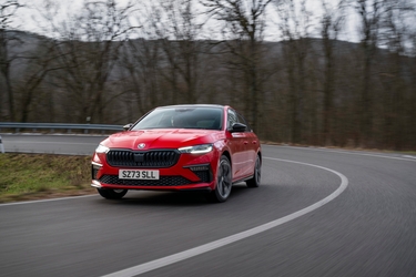 Red Skoda Scala facelift cornering