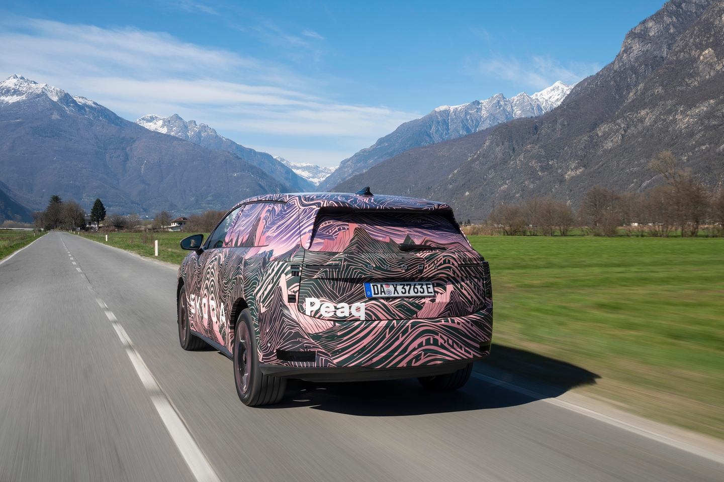 skoda peaq camo driving rear three quarters