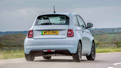 Fiat 500e driving rear view