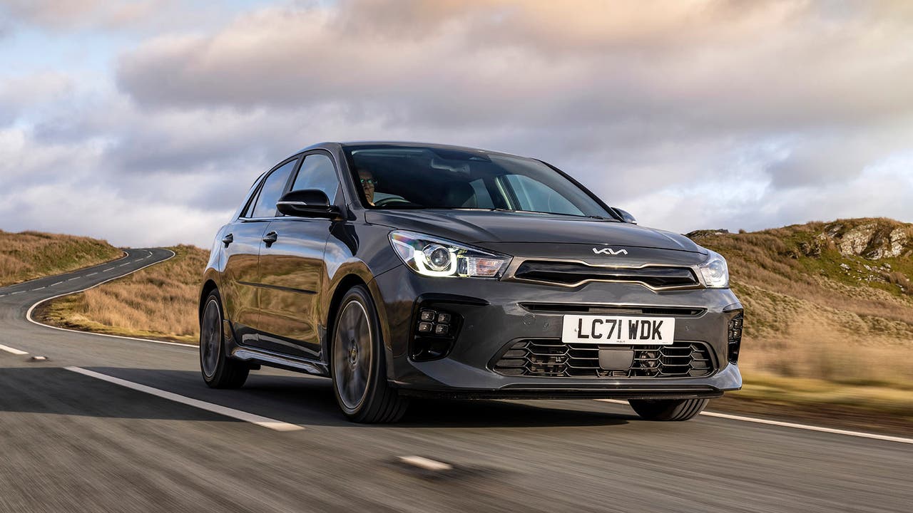 Kia Rio in grey, driving shot