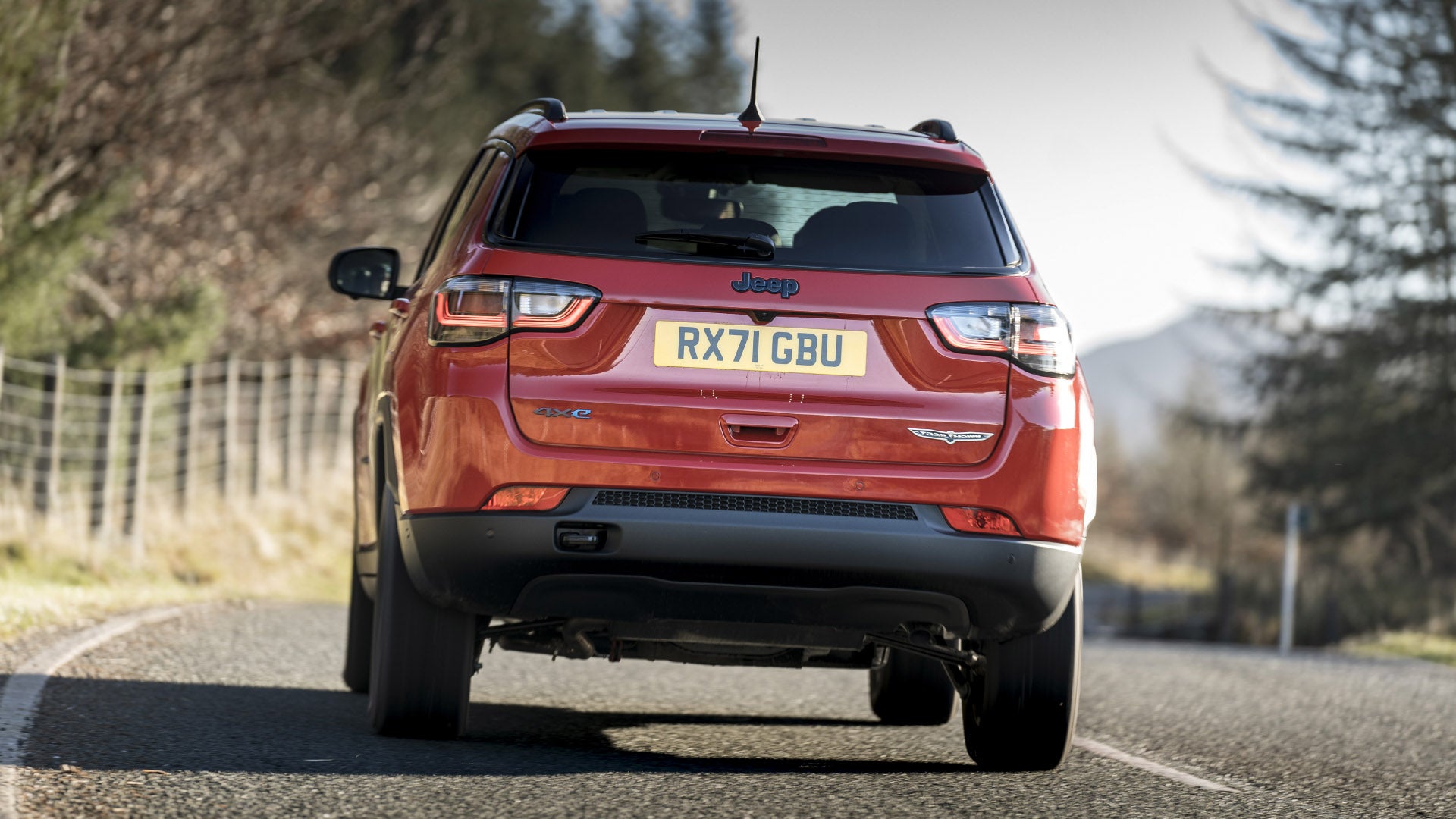 Jeep Compass Trailhawk driving rear end view