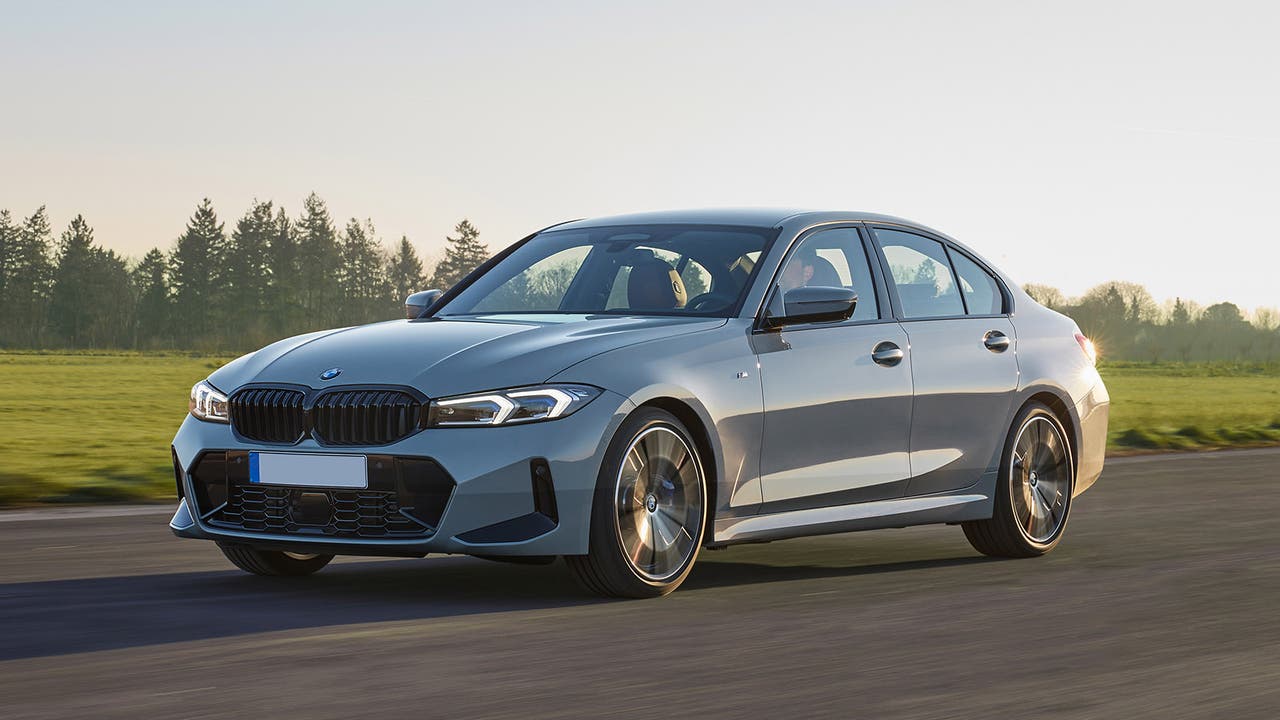 BMW 3 Series in grey, driving shot