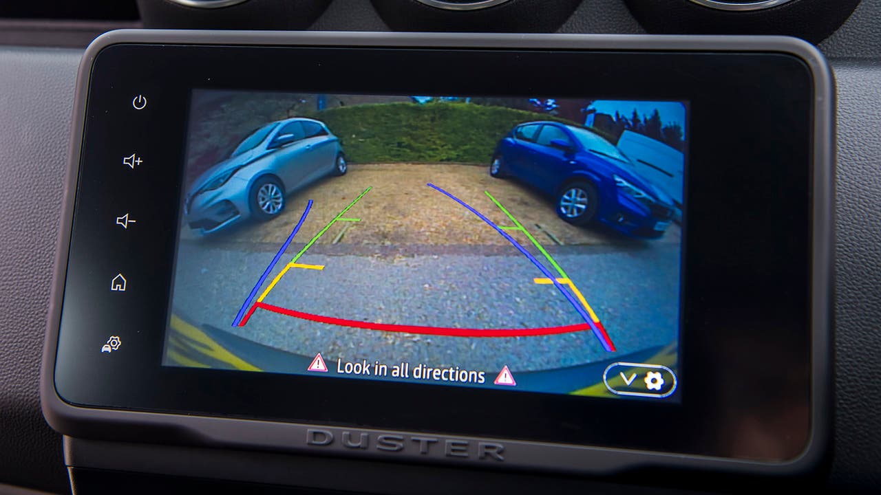 A reversing camera output seen on a Dacia Duster's infotainment system