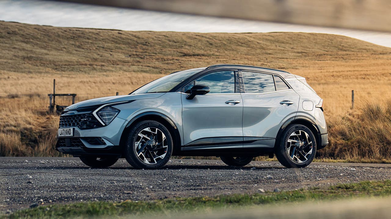 Kia Sportage in green/grey