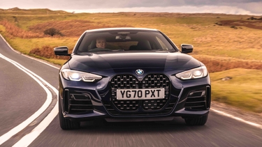 BMW 4 Series driving front end view