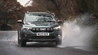 Dacia Sandero Stepway driving through puddle