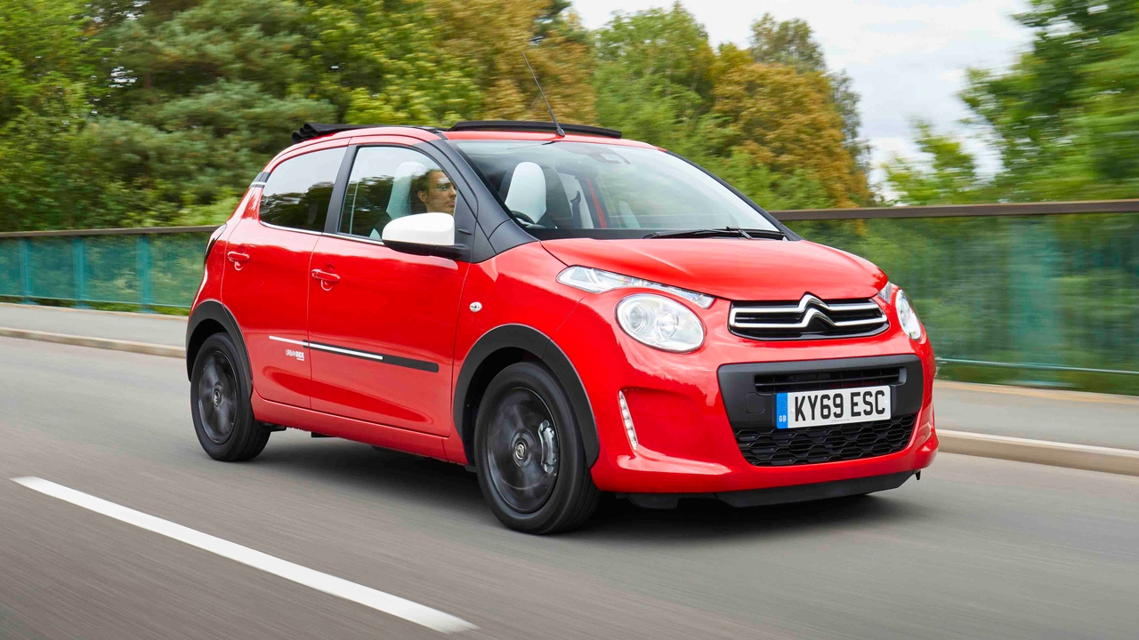 Red Citroen C1 driving