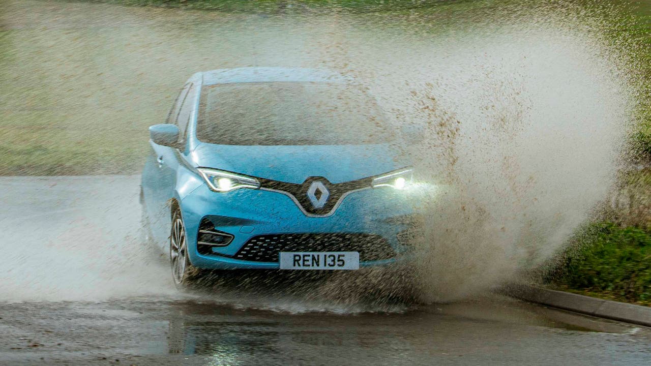 Renault Zoe driving through large puddle