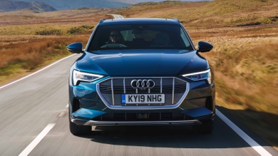 Audi e-tron driving front view