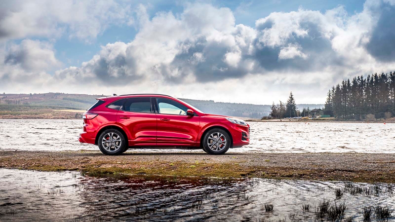 Ford Kuga in red, side shot