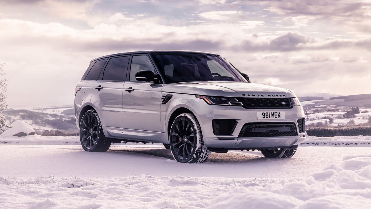 Range Rover Sport in silver, static snow shot