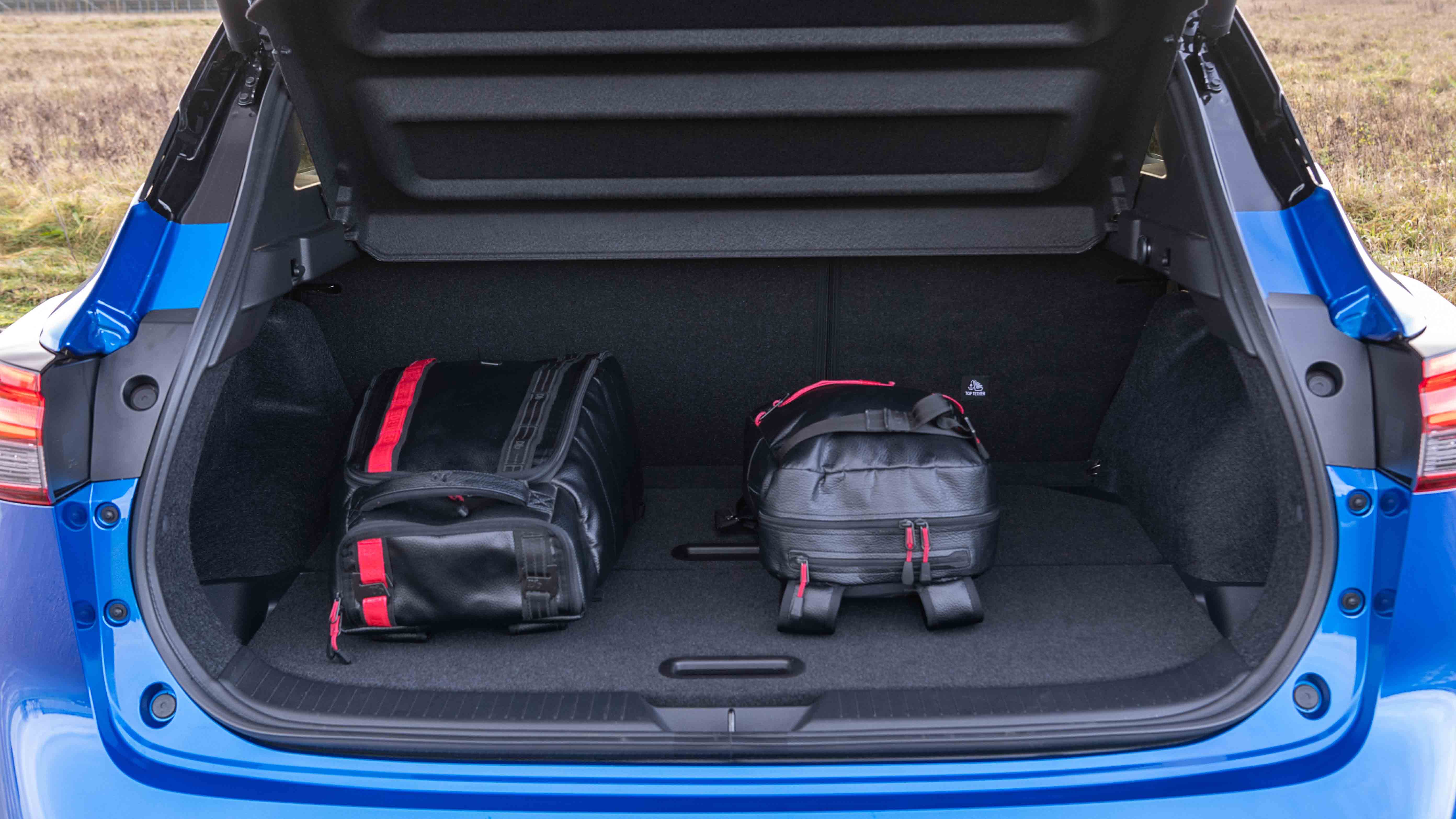 Nissan Qashqai boot with suitcases in