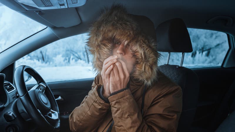 Man in cold car, winter