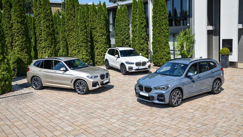 BMW SUV group shot – BMW X3 (left), BMW X5 (middle), BMW X1 (right)