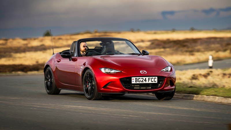 Mazda MX-5 in red, front three quarter