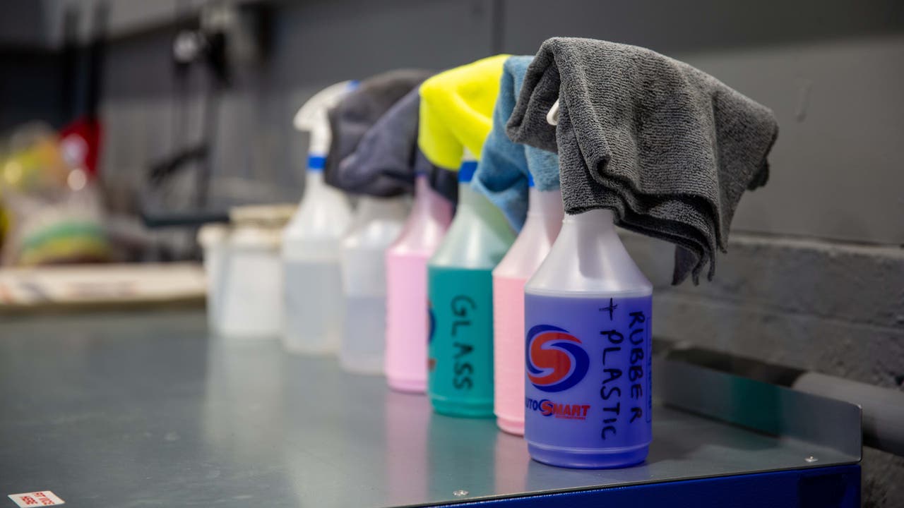 A range of car cleaning bottles and cloths