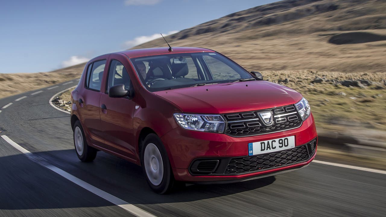 Dacia Sandero in red, driving shot