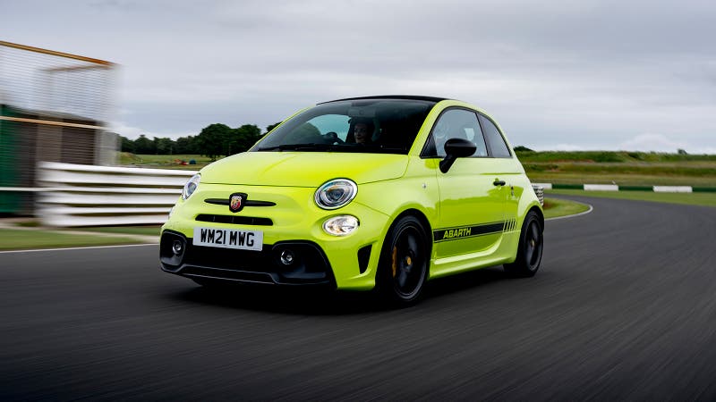 Abarth 595 in highlighter yellow, driving shot