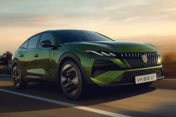Peugeot E-408 in green, front three quarter