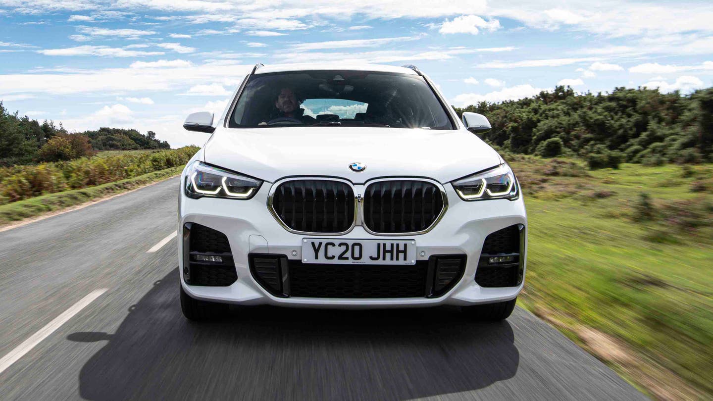 BMW X1 driving front end view