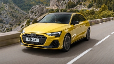 Yellow Audi S3 driving