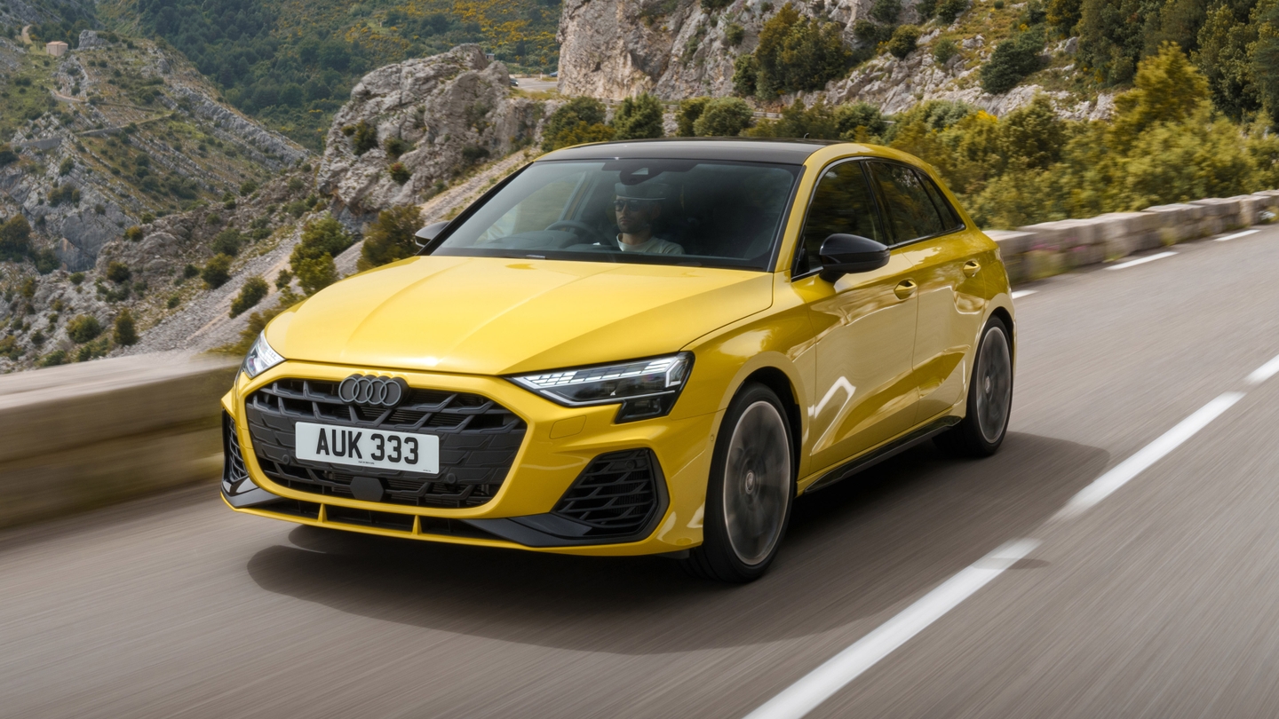 Yellow Audi S3 driving