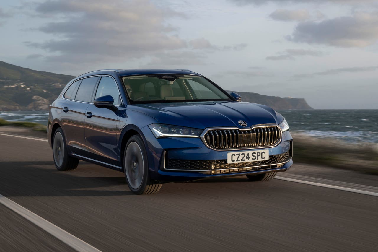 2024 Skoda Superb blue driving front three quarters