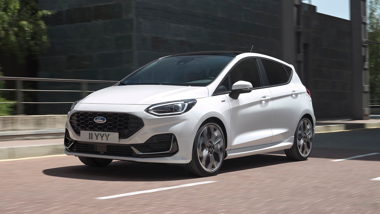 Ford Fiesta hatchback in white, driving shot.