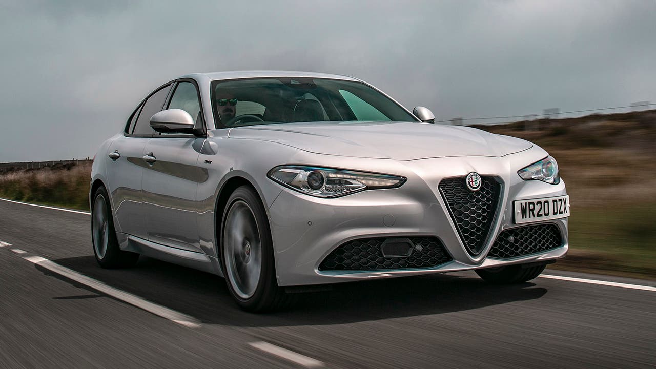 Alfa Romeo Giulia in silver, driving shot