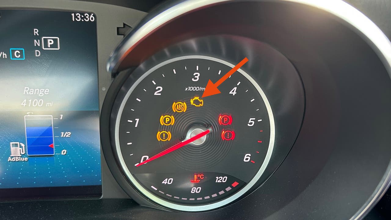 Mercedes C-Class, how to reset check engine light. Startup warning lights shown, check engine light highlighted.