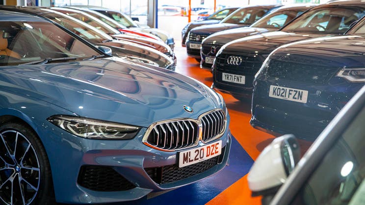 What are the advantages of buying nearly new cars?