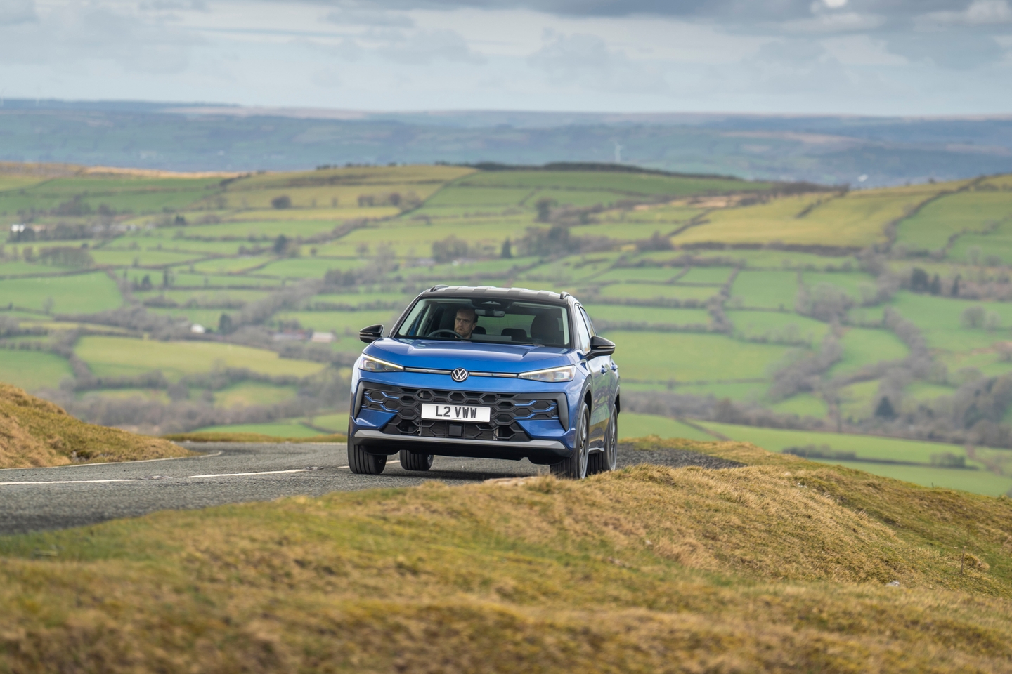2026 VW T Roc front driving cornering scenic