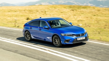 Blue Honda Civic driving