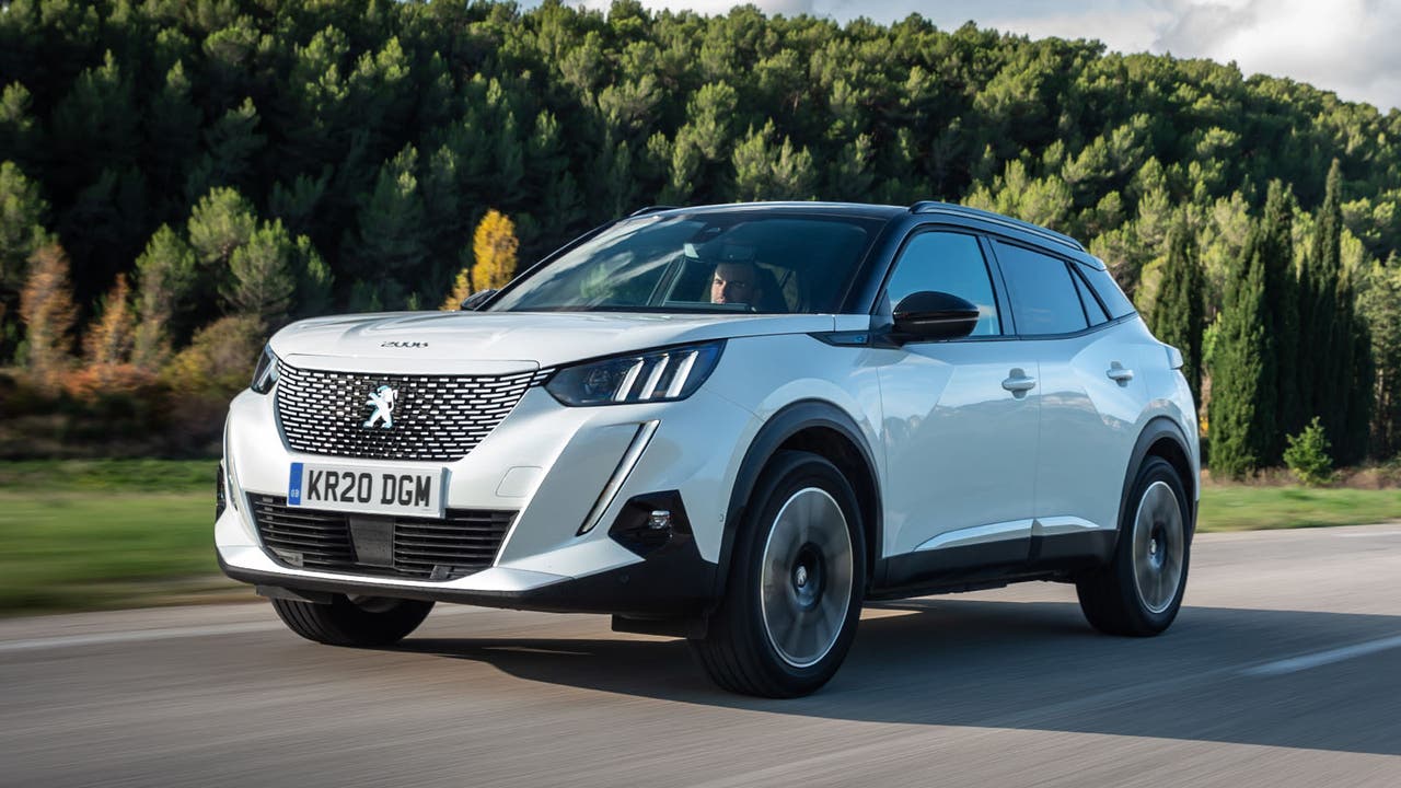 Peugeot e-2008 in white, driving shot