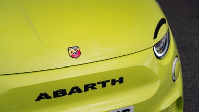 Abarth 500e review – headlight and badge detail