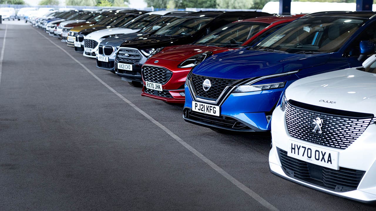 Row of used cars at a Motorpoint store