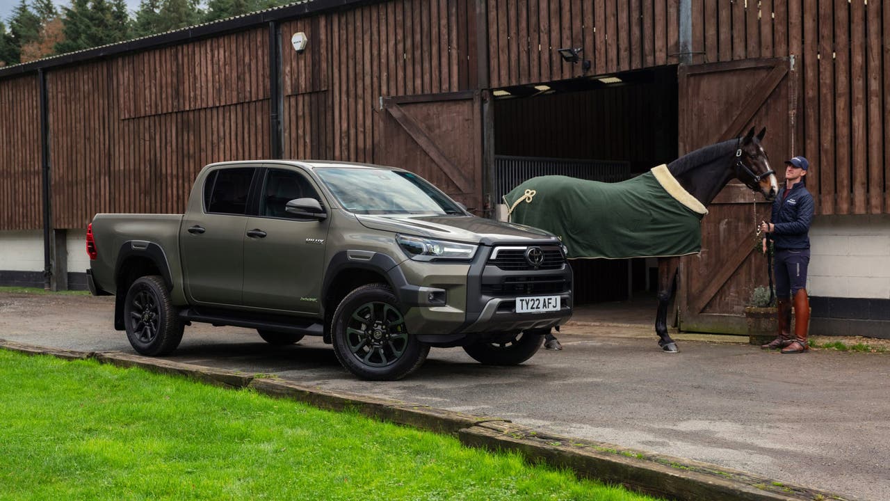 Toyota Hilux Invincible next to horse