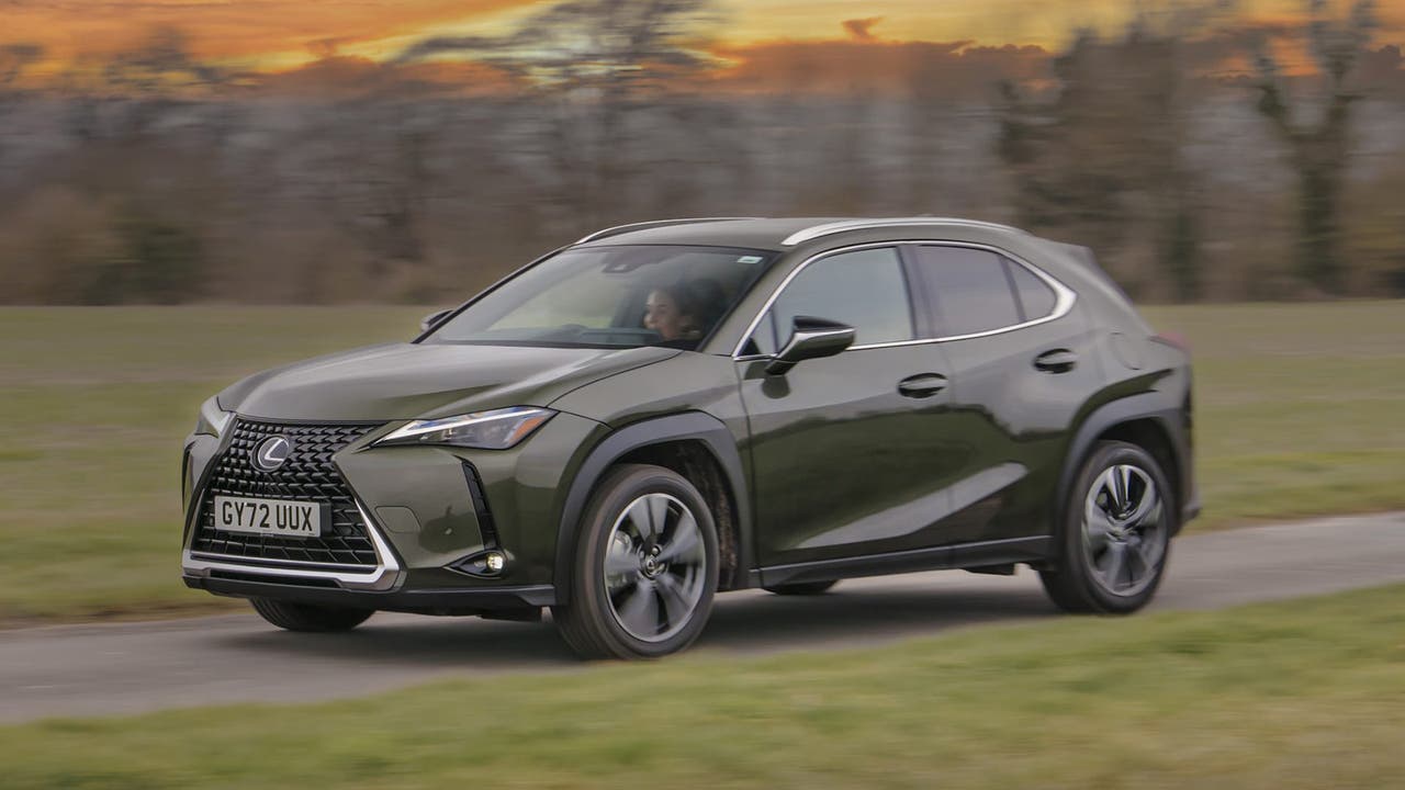 Lexus UX 250h in green, driving shot