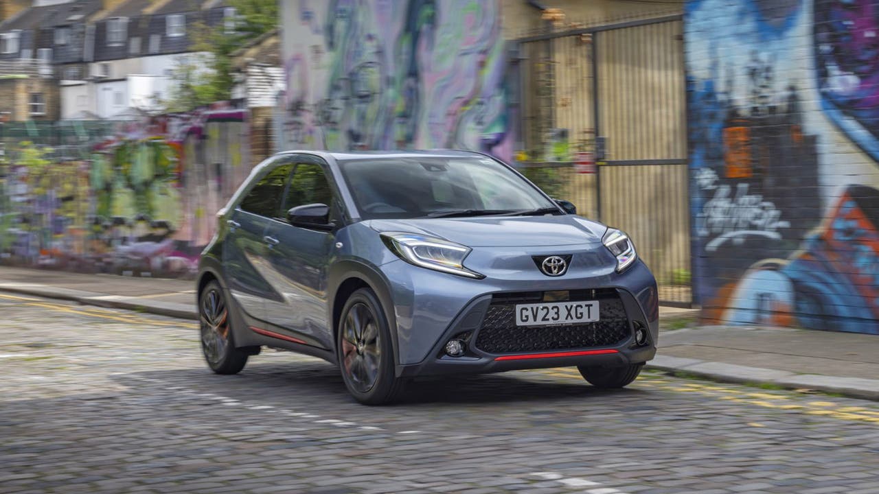 Toyota Aygo X in grey, driving shot