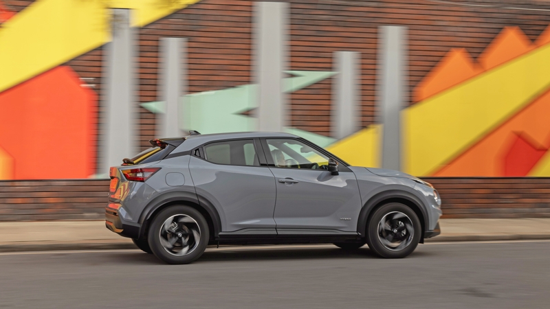 Nissan Juke Hybrid grey driving side view