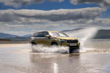 2024 Skoda Kodiaq driving beach water splash