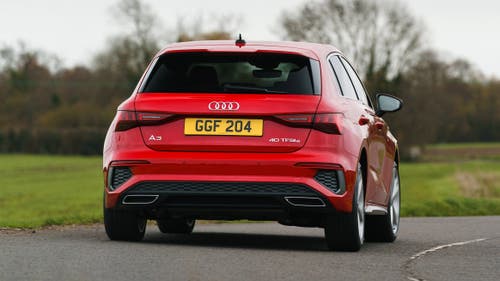 Audi A3 driving rear view