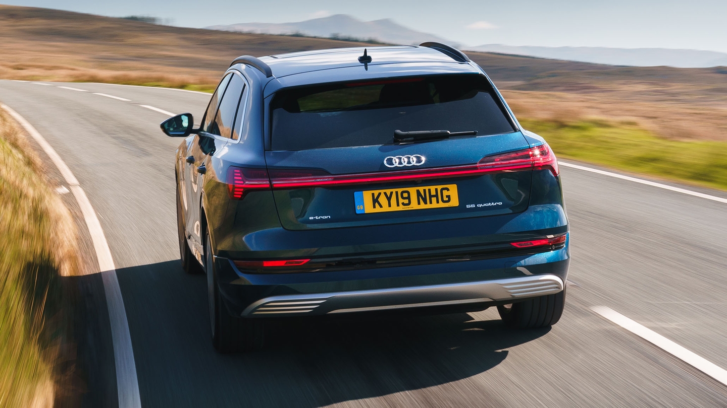 Audi e-tron driving rear view