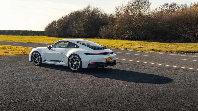 Porsche 911 (Carrera T) in white, rear three quarter