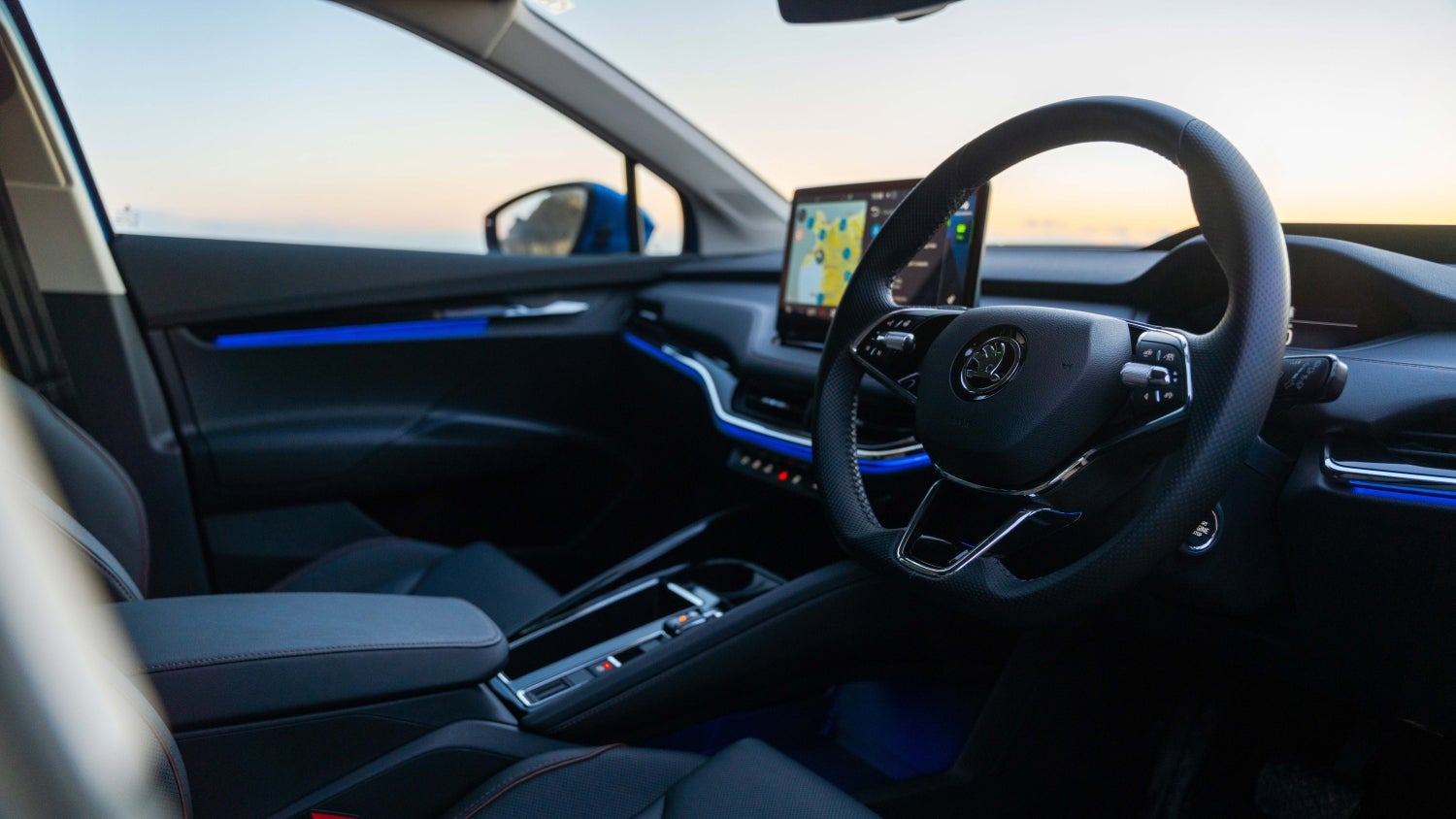 Skoda Enyaq interior at dusk with ambient lighting