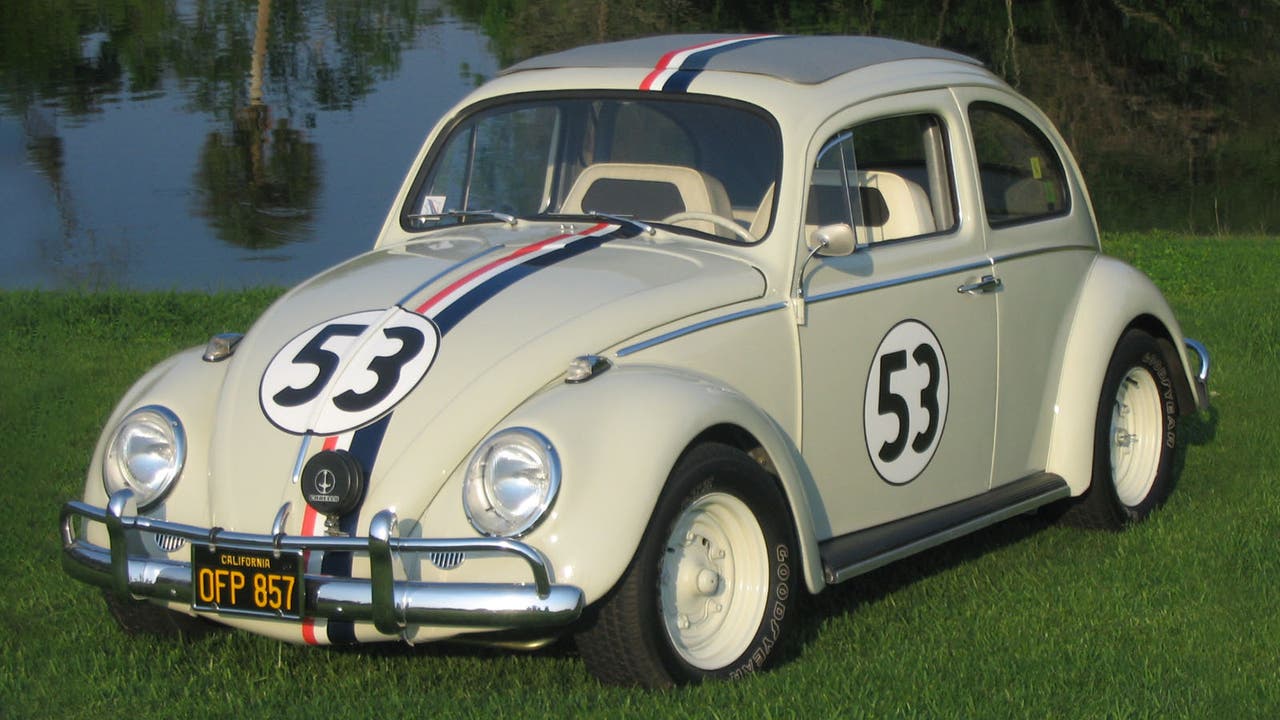 Herbie/Volkswagen Beetle parked on grass