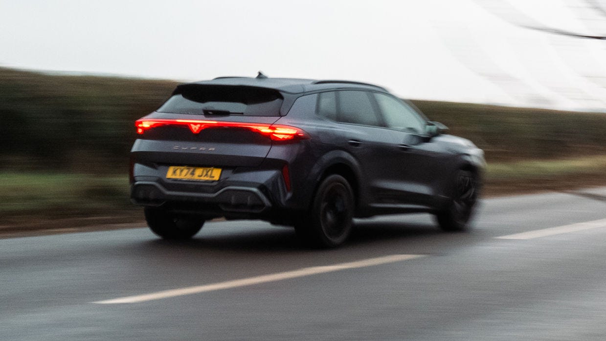 Cupra Terramar driving rear view
