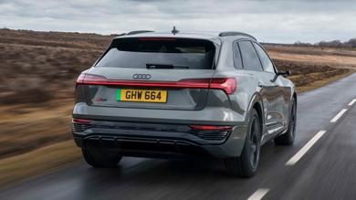Audi Q8 e-tron driving rear view
