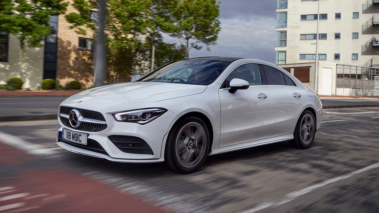 Mercedes CLA in white, driving shot